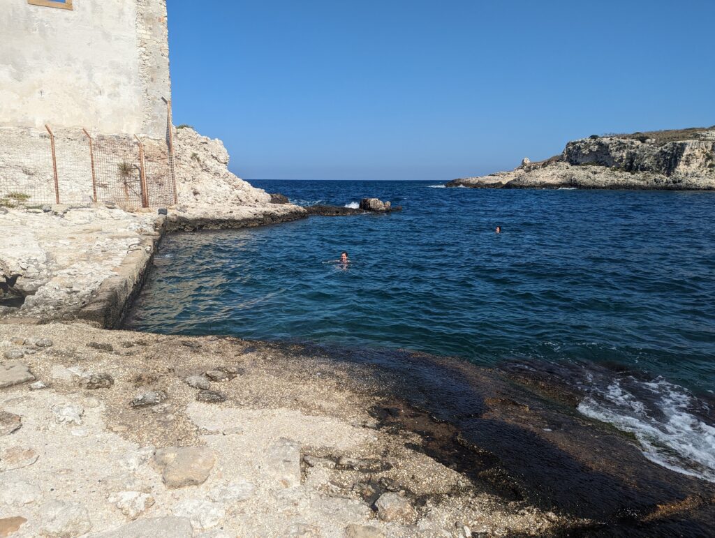 Swimming near the ruins at the Tonnara di Santa Panagia Sicily bike travel