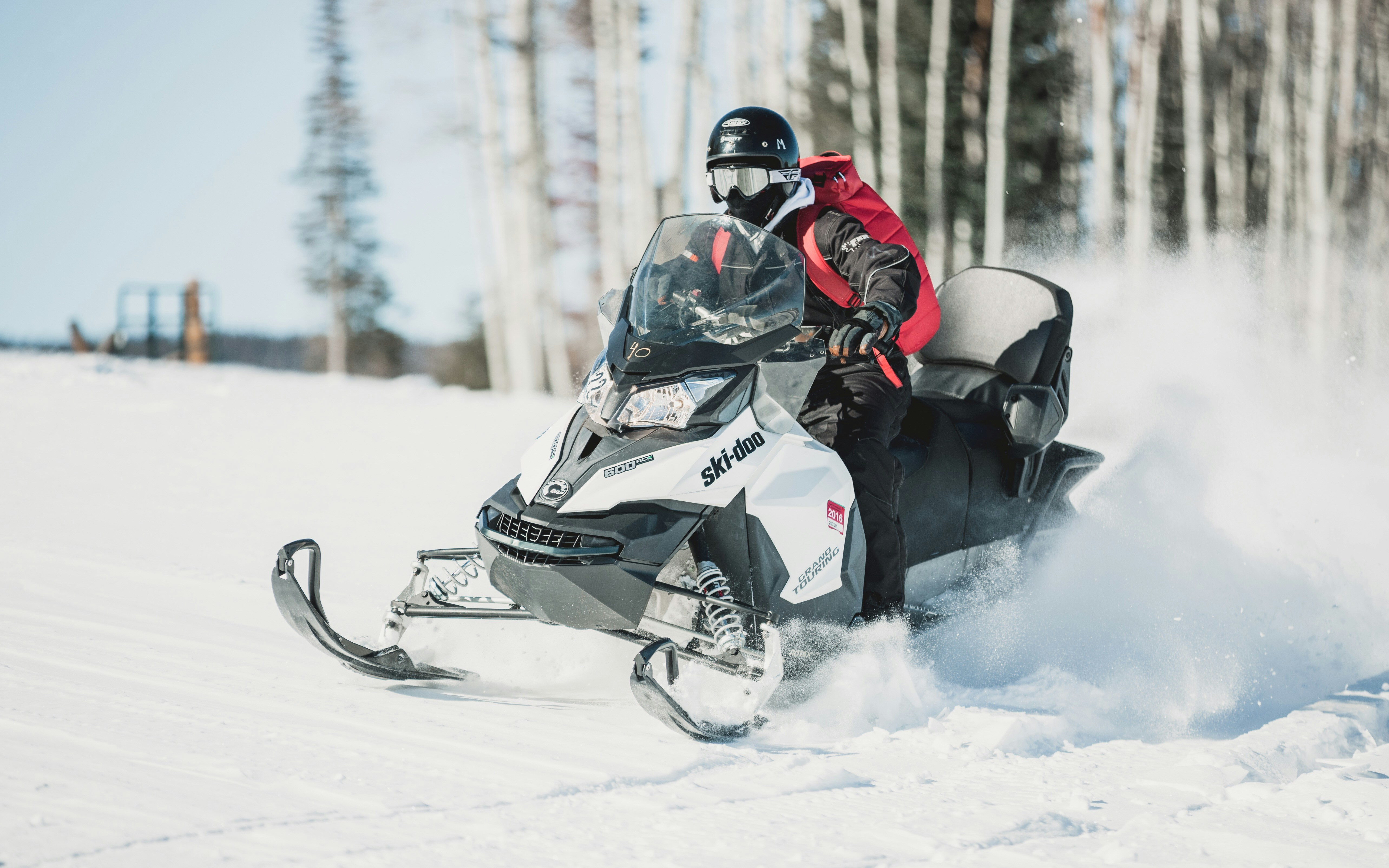 Winter Parl ski vacation snowmobile day