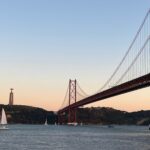 Lisbon hidden gems Christ the King Statue from Doca di Alcantara