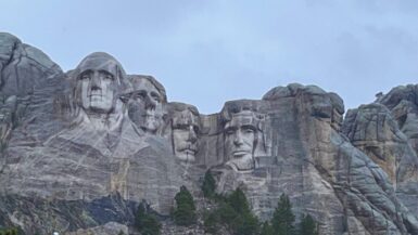 Mount Rushmore crying on a rainy day