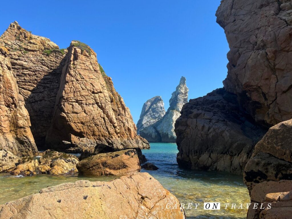 View through the rocks at Praia da Ursa