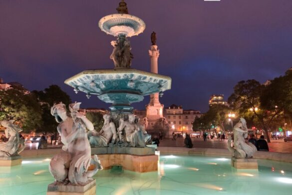 Mermaid statues and fountain Rossio Square Lisbon