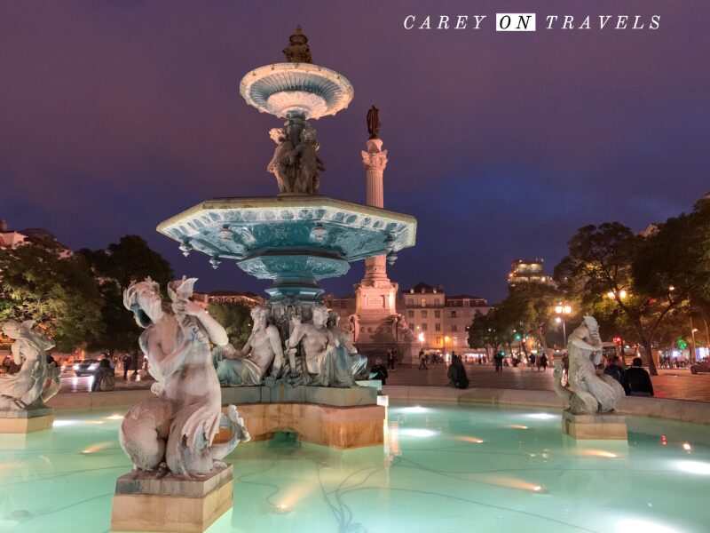 Mermaid statues and fountain Rossio Square Lisbon