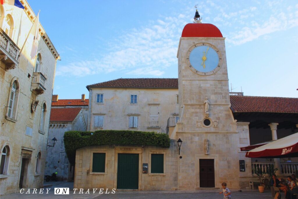 Saint Sebastian's church with the clock tower on Trogir